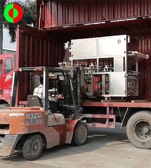 大型連續(xù)盒式真空包裝封口生產(chǎn)設(shè)備出貨交付客戶!